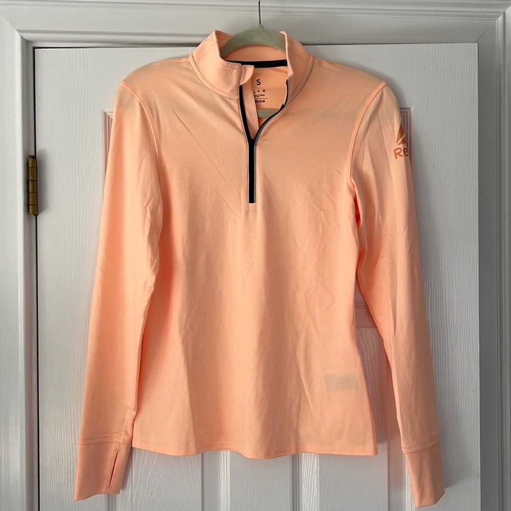 Womens Reebok half zip, color orange